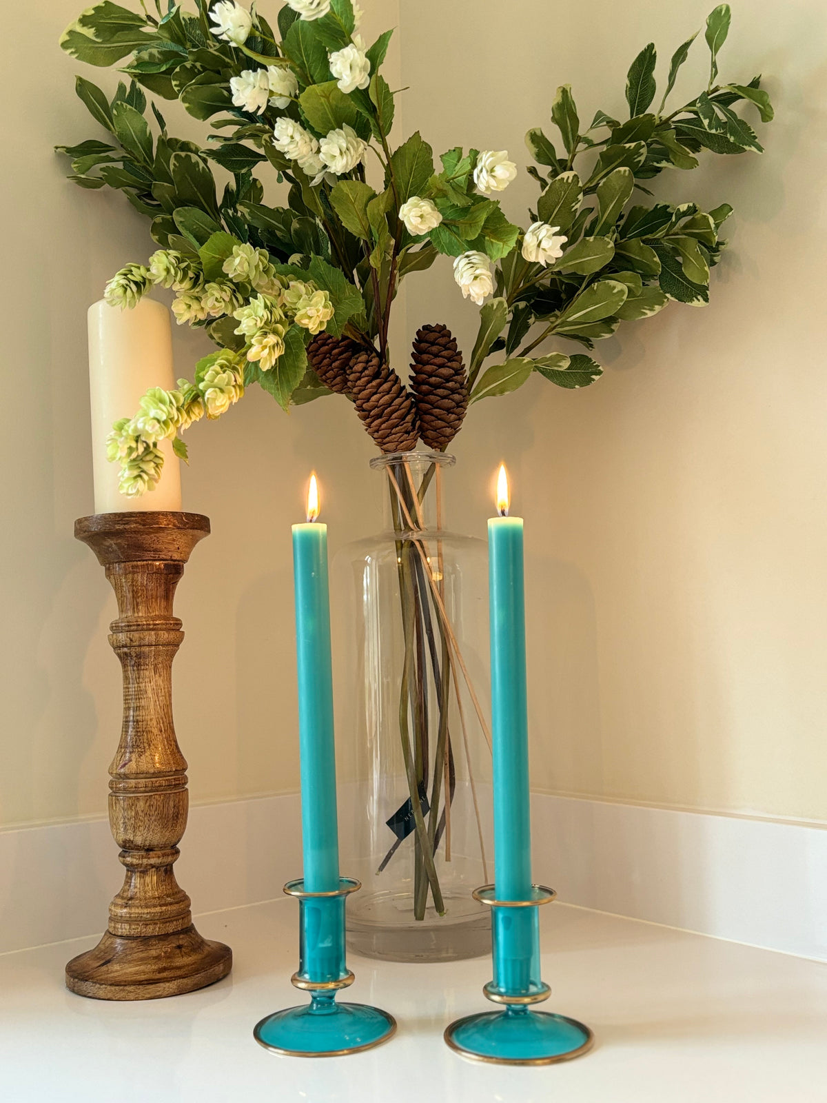 Turquoise blue,  12ct gold trimmed handblown candlesttikcs from Alara London