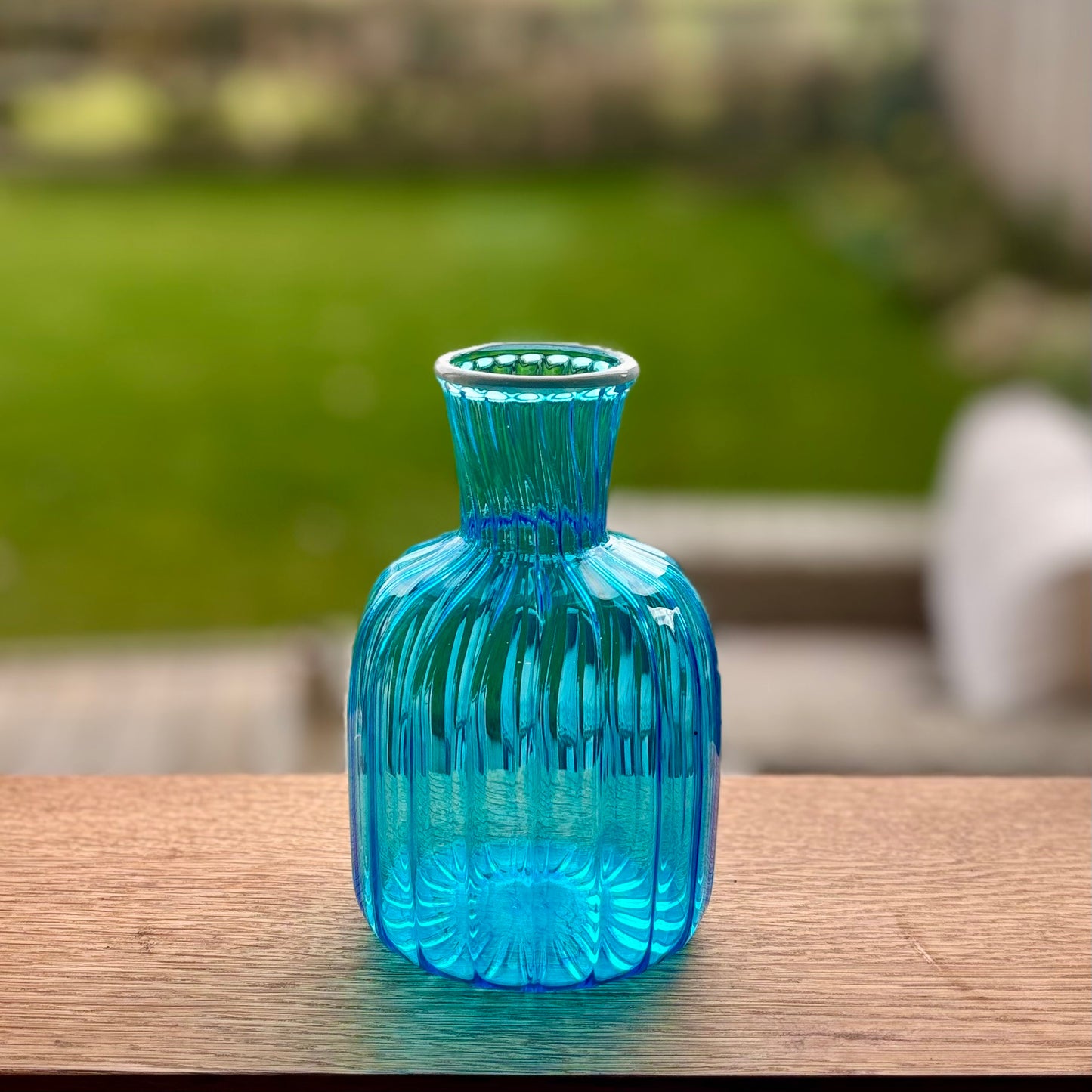 Blue ribbed glass vase